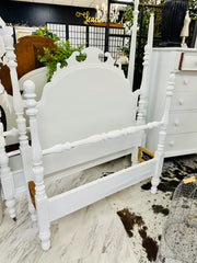 White vintage twin bed