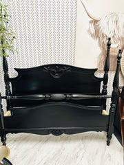 Black antique full bed w/wood rails