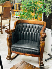 Antique carved rocking chair