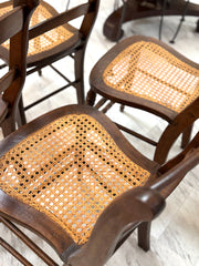 Four vintage cane-back dining chairs (4)