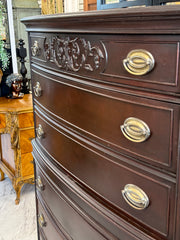 Antique bow front chest