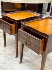 Vintage leather-top side tables on casters (2)
