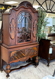 Antique Jacobean China cabinet on casters