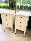 Pair of vintage nightstands on casters