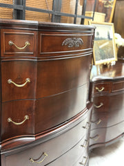 Antique mahogany serpentine chest on chest