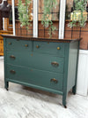 Vintage 4-drawer chest on casters ￼