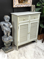 Two-tone louvered cabinet