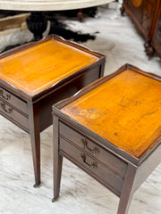 Vintage leather-top side tables on casters (2)