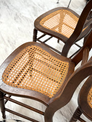Four vintage cane-back dining chairs (4)