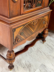 Antique Jacobean China cabinet on casters