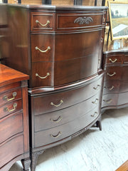 Antique mahogany serpentine chest on chest
