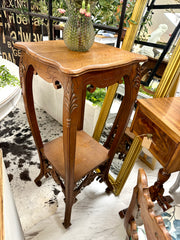 Carved wood plant stand