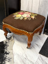 Needlepoint ottoman on casters ￼