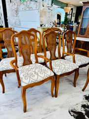 French Provincial table and 6 cane-back chairs ￼