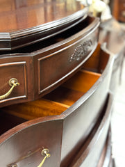 Antique mahogany serpentine chest on chest