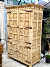 Carved wood armoire
