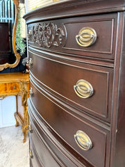 Antique bow front chest