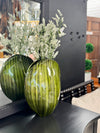 Green tortoise shell style vase w/2 white floral stem bundles