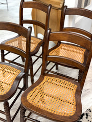 Four vintage cane-back dining chairs (4)