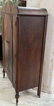 Antique cedar-lined chifferobe on casters