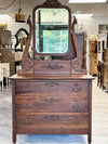 Antique dark oak dresser on casters w/mirror