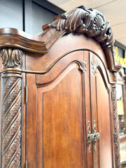 Carved armoire/tv stand