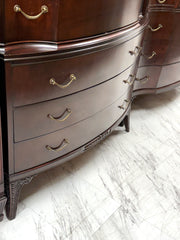 Antique mahogany serpentine chest on chest