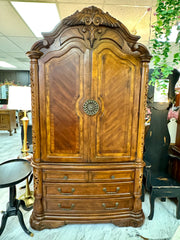 Carved wood armoire w/hidden mirrored panels
