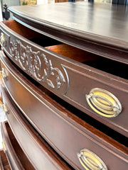 Antique bow front chest