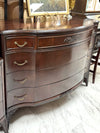 Antique serpentine dresser