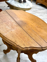 Antique wood side table on casters