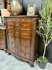 Carved chest of drawers