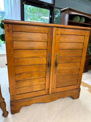 Vintage louvered style cabinet