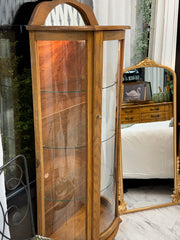 Vintage lighted curio cabinet