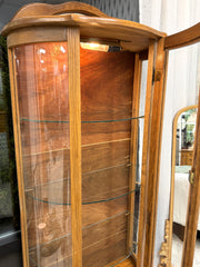 Vintage lighted curio cabinet