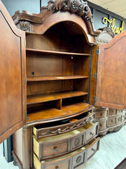 Carved armoire/tv stand