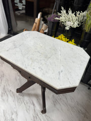 Antique table w/marble top on casters