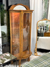 Vintage lighted curio cabinet