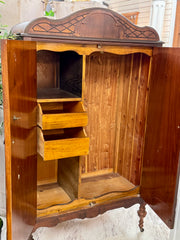 Antique cedar-lined chifferobe on casters