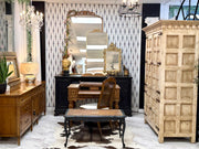 Carved wood armoire