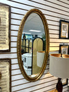 Gold vintage oval mirror