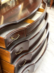 Antique serpentine dresser