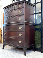 Antique bow front chest