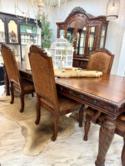 Carved dining table & 6 chairs