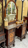Antique carved vanity w/mirror on casters
