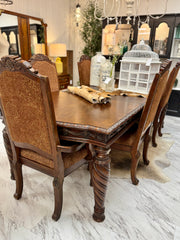 Carved dining table & 6 chairs