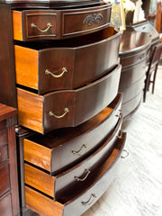 Antique mahogany serpentine chest on chest
