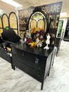 Vintage black dresser on casters w/mirror