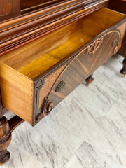 Antique Jacobean China cabinet on casters