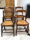 Four vintage cane-back dining chairs (4)